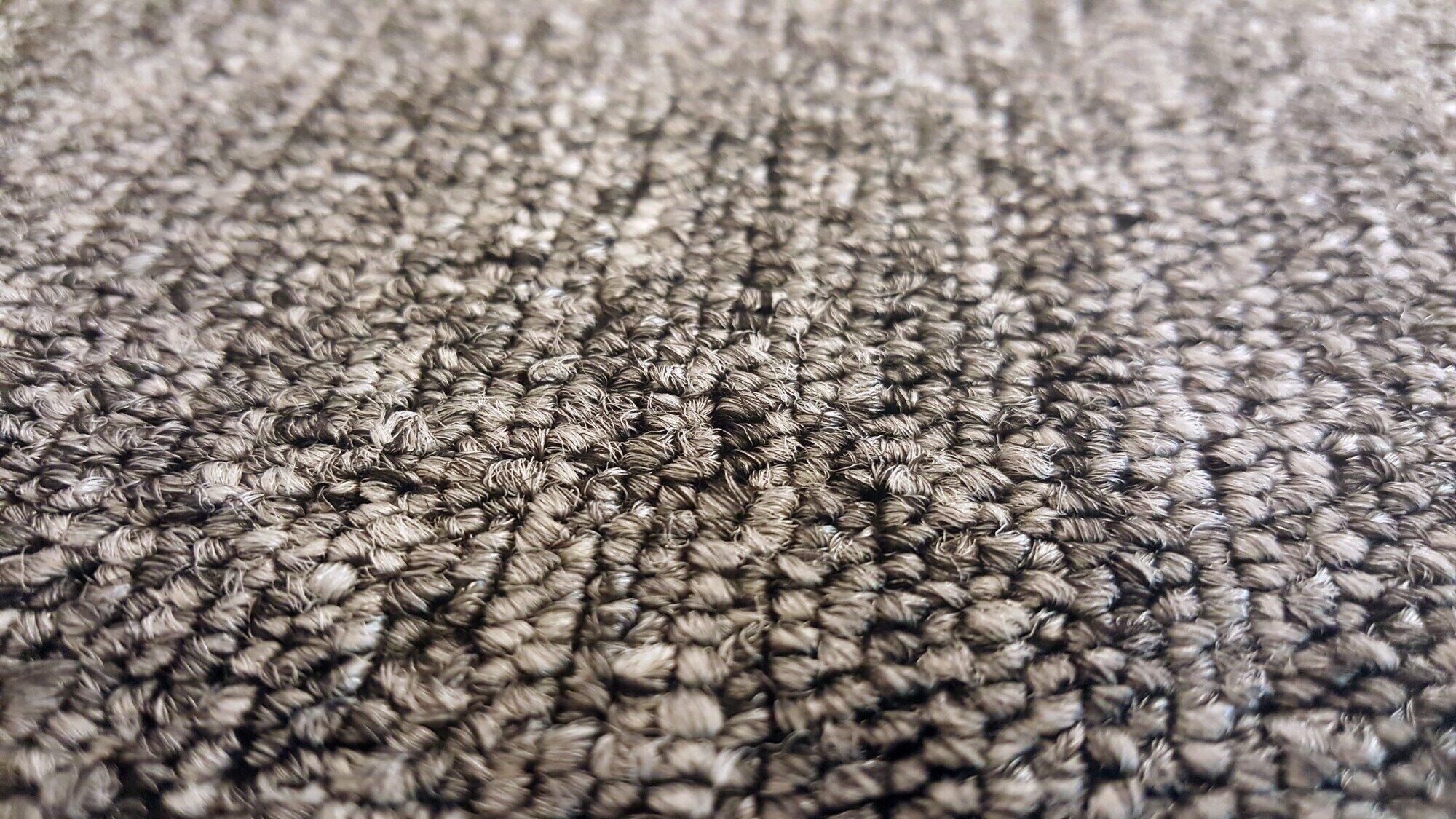 Image of water damaged carpet up close